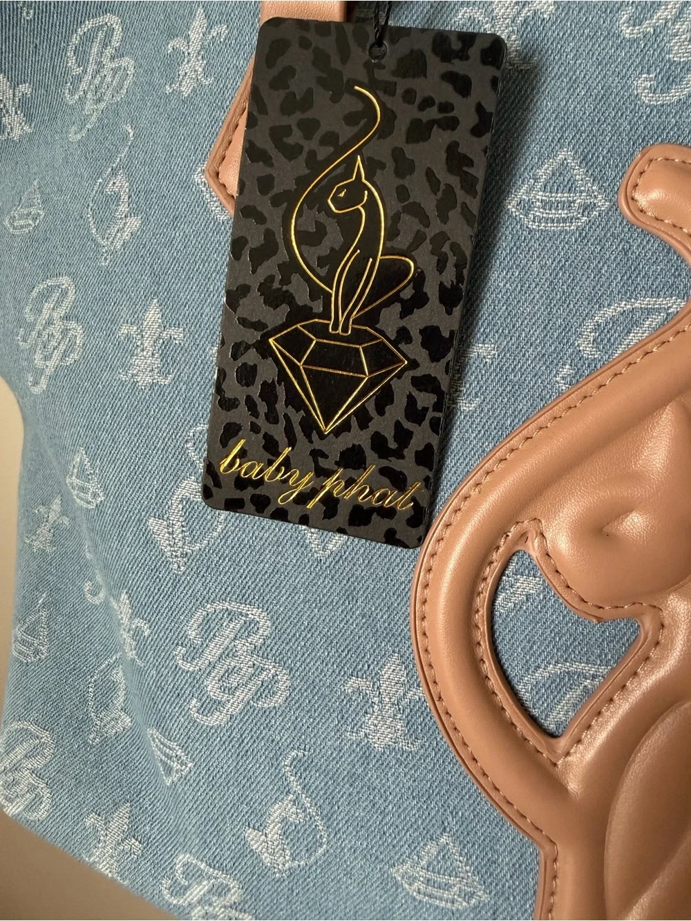 Baby Phat Blue Denim monogram Tote bag with Brown leather Trim and pouch.